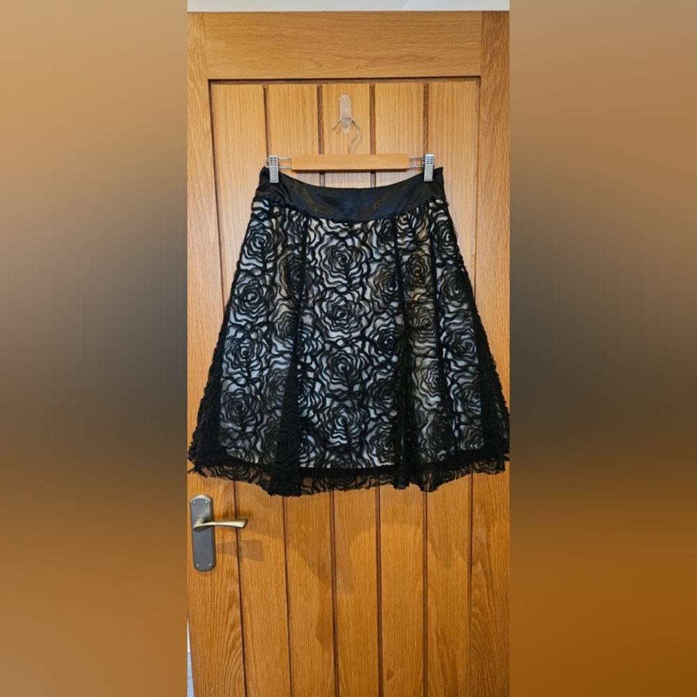 black mesh knee length skirt
